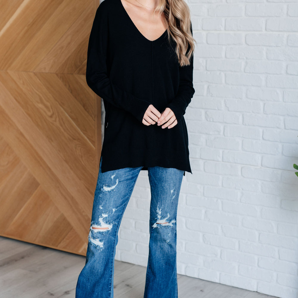 
                      
                        V-Neck Front Seam Sweater in Black
                      
                    