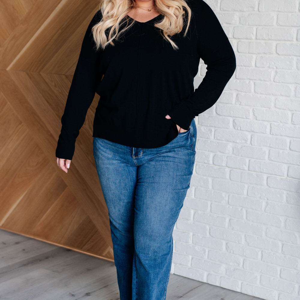 
                      
                        V-Neck Front Seam Sweater in Black
                      
                    