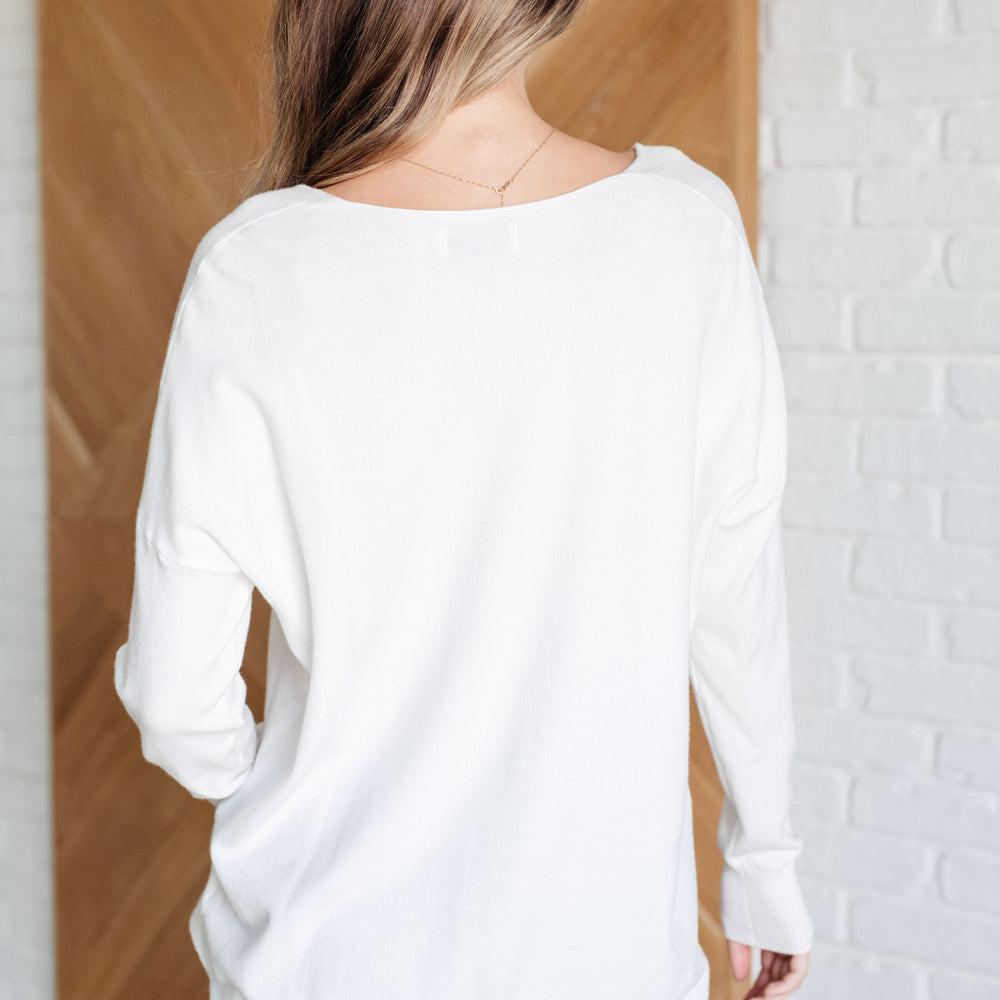 
                      
                        V-Neck Front Seam Sweater in Ivory
                      
                    