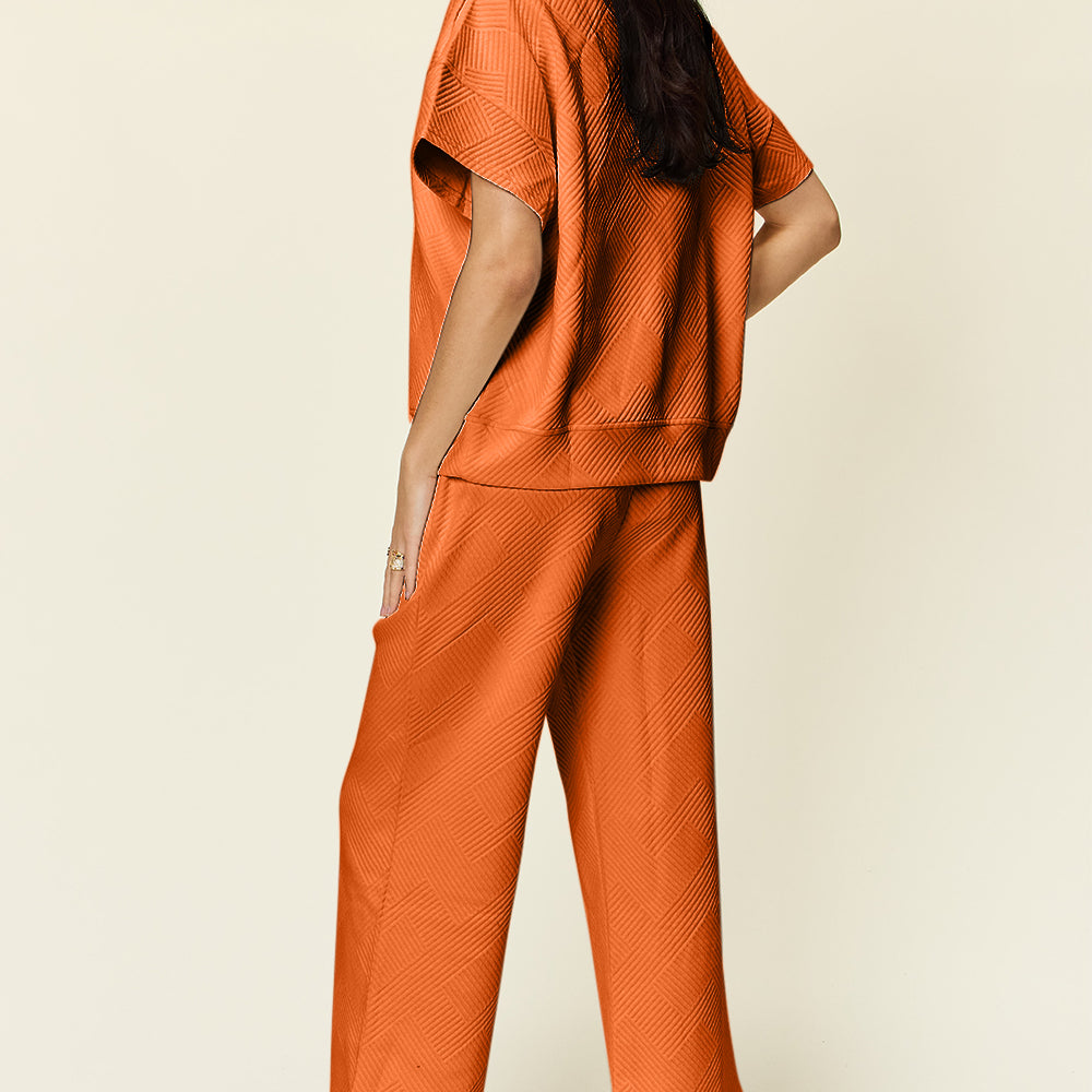 
                      
                        Texture Half Zip Short Sleeve Top and Pants Set
                      
                    