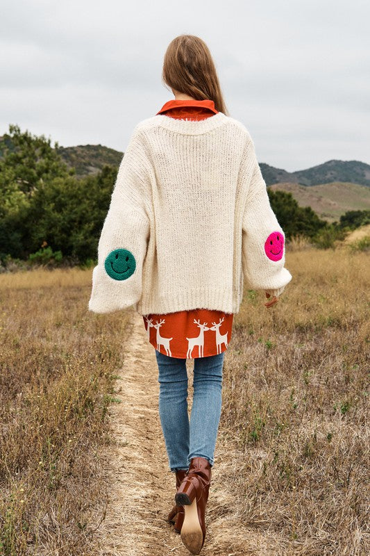 
                      
                        The Fuzzy Smile Long Bell Sleeve Knit Cardigan
                      
                    