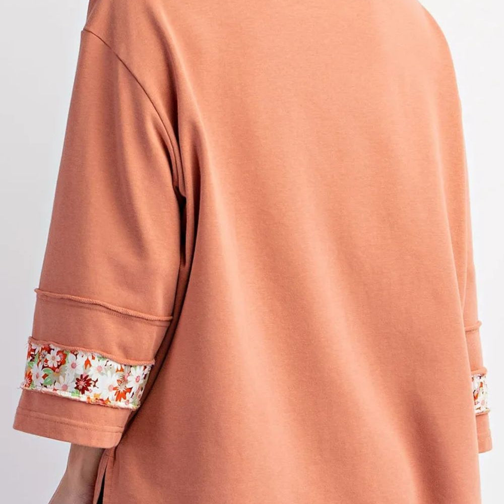 
                      
                        Exposed Seam Slit Floral Round Neck Blouse
                      
                    