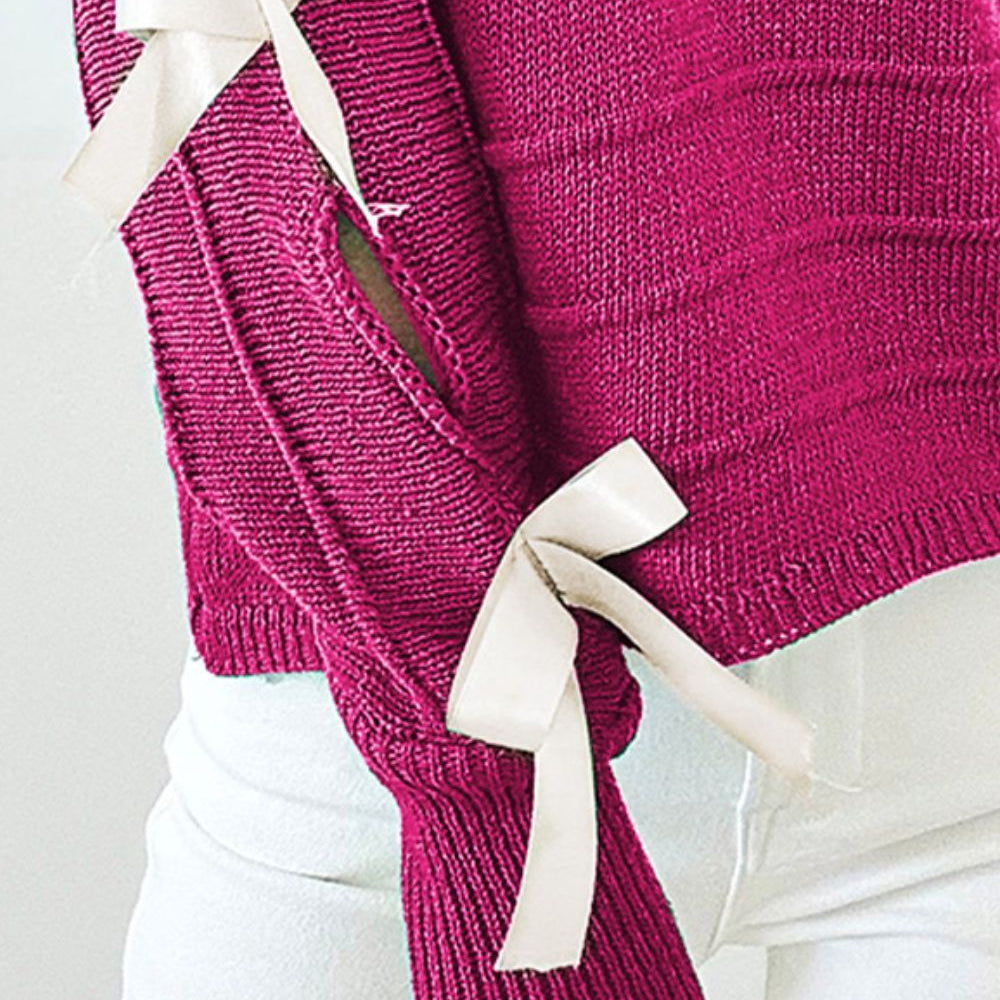 
                      
                        Bow Cutout Round Neck Long Sleeve Knit Top
                      
                    