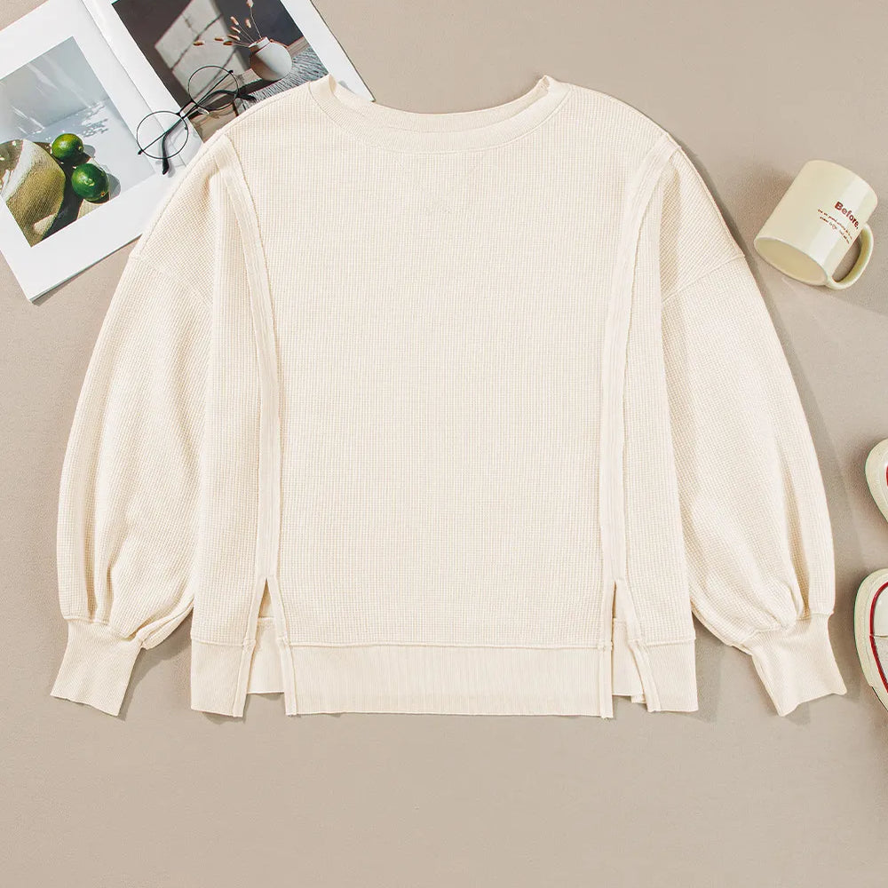 
                      
                        Slit Waffle-Knit Round Neck Long Sleeve Top
                      
                    