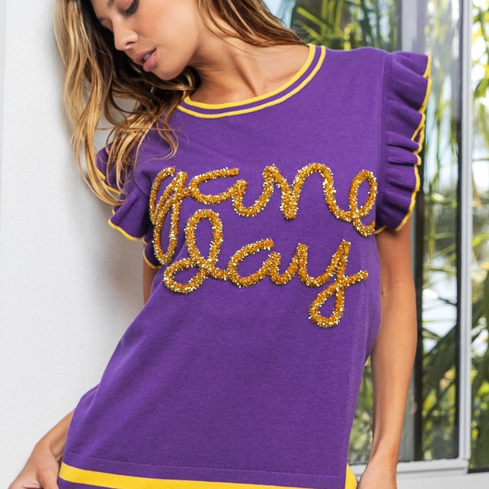 
                      
                        Game Day Letter Contrast Trim Ruffled Sleeveless Sweater
                      
                    