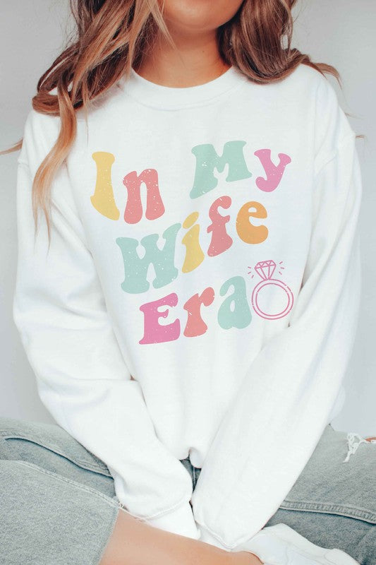 
                      
                        IN MY WIFE ERA Graphic Sweatshirt
                      
                    