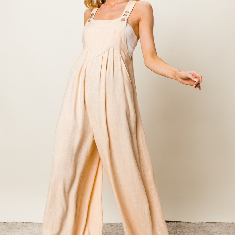 
                      
                        Textured Sleeveless Wide Leg Jumpsuit
                      
                    