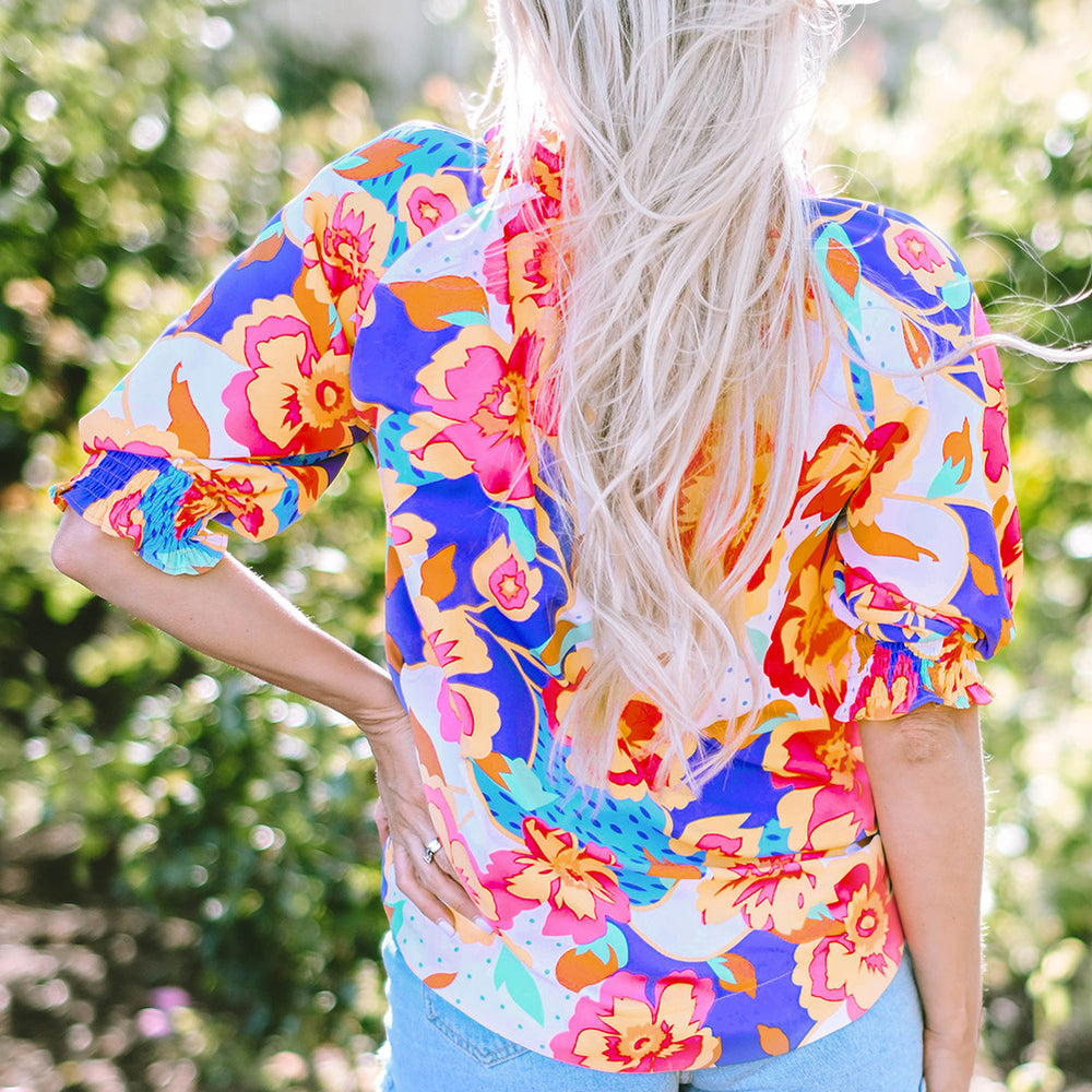 
                      
                        Printed Notched Half Sleeve Blouse
                      
                    