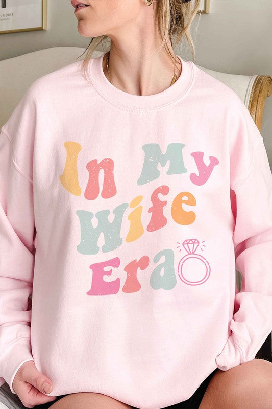 
                      
                        IN MY WIFE ERA Graphic Sweatshirt
                      
                    