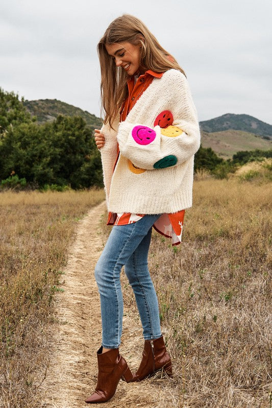 
                      
                        The Fuzzy Smile Long Bell Sleeve Knit Cardigan
                      
                    