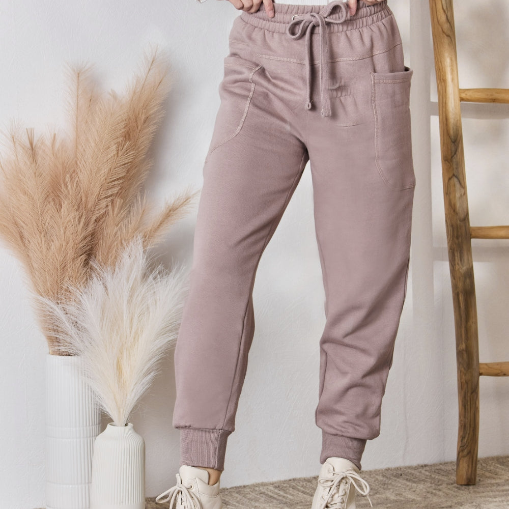 
                      
                        RISEN Drawstring Pocketed Joggers
                      
                    