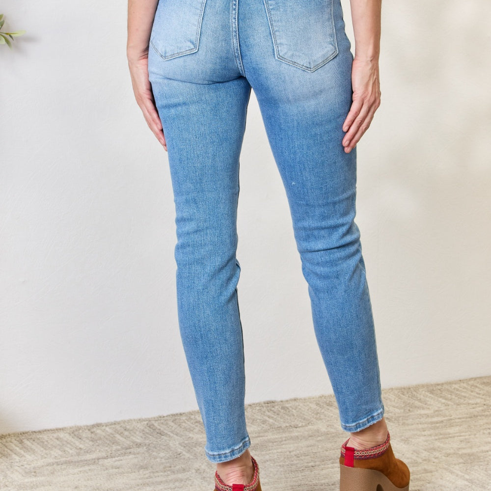 
                      
                        RISEN Mid Rise Skinny Jeans
                      
                    