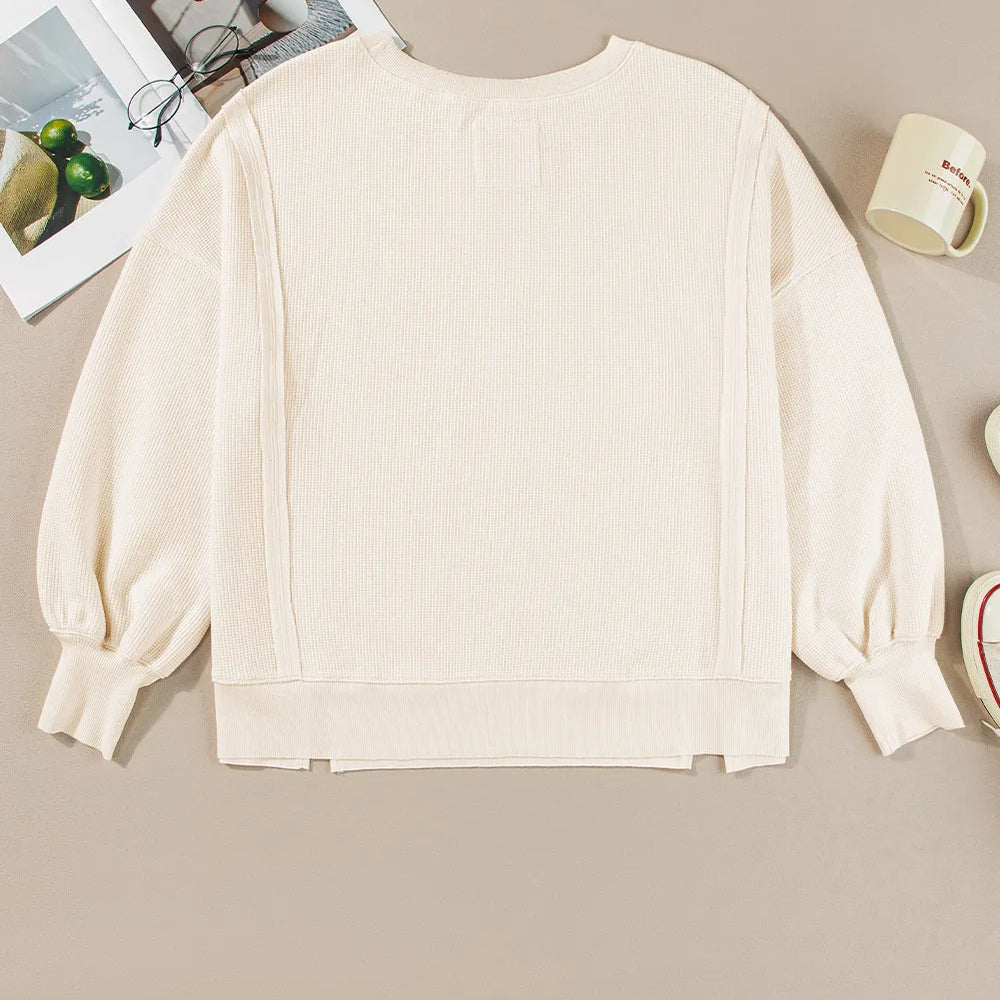 
                      
                        Slit Waffle-Knit Round Neck Long Sleeve Top
                      
                    