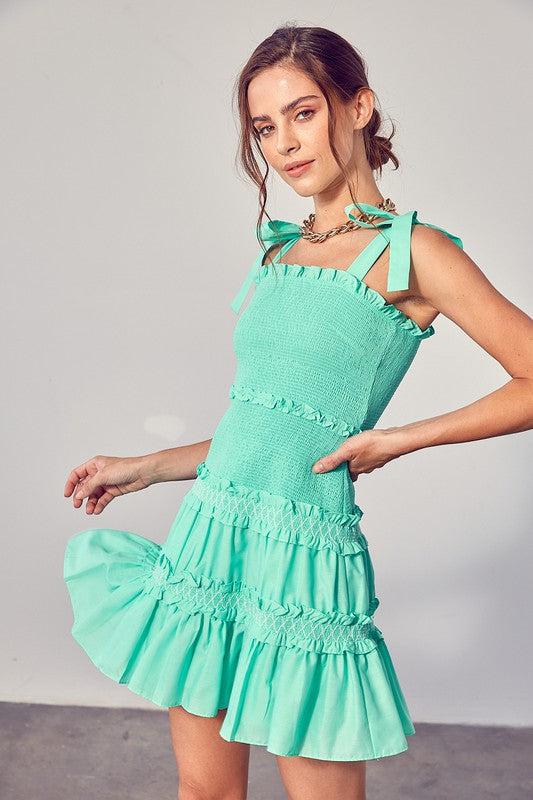 Load image into Gallery viewer, Nina Smocked Bow Tie Tiered Mini Dress

