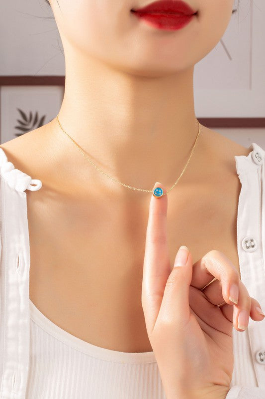 Mini smiley face pendant necklace