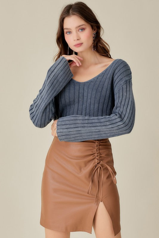 
                      
                        Washed Cropped V Neck Sweater
                      
                    