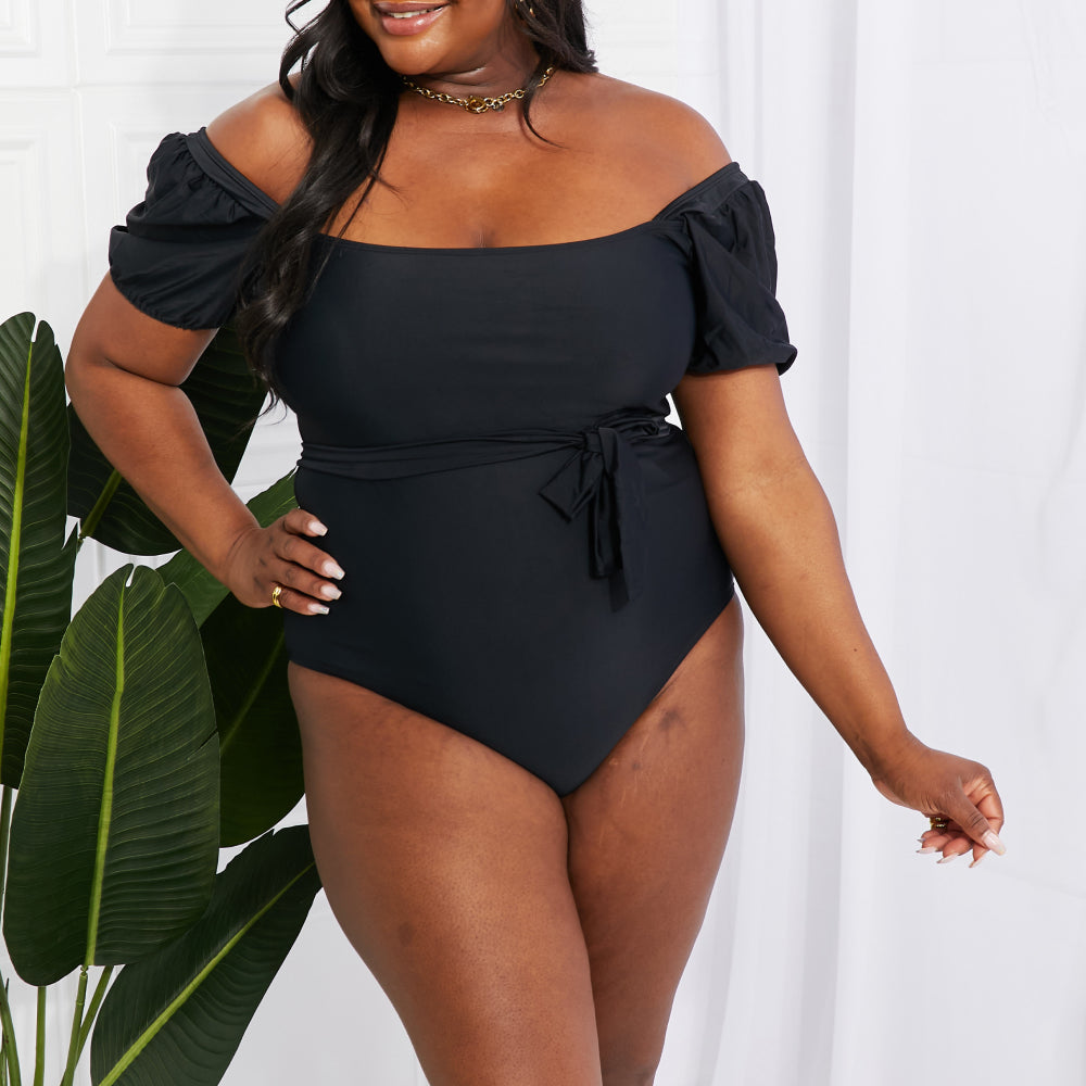 
                      
                        Salty Air Puff Sleeve One-Piece in Black
                      
                    