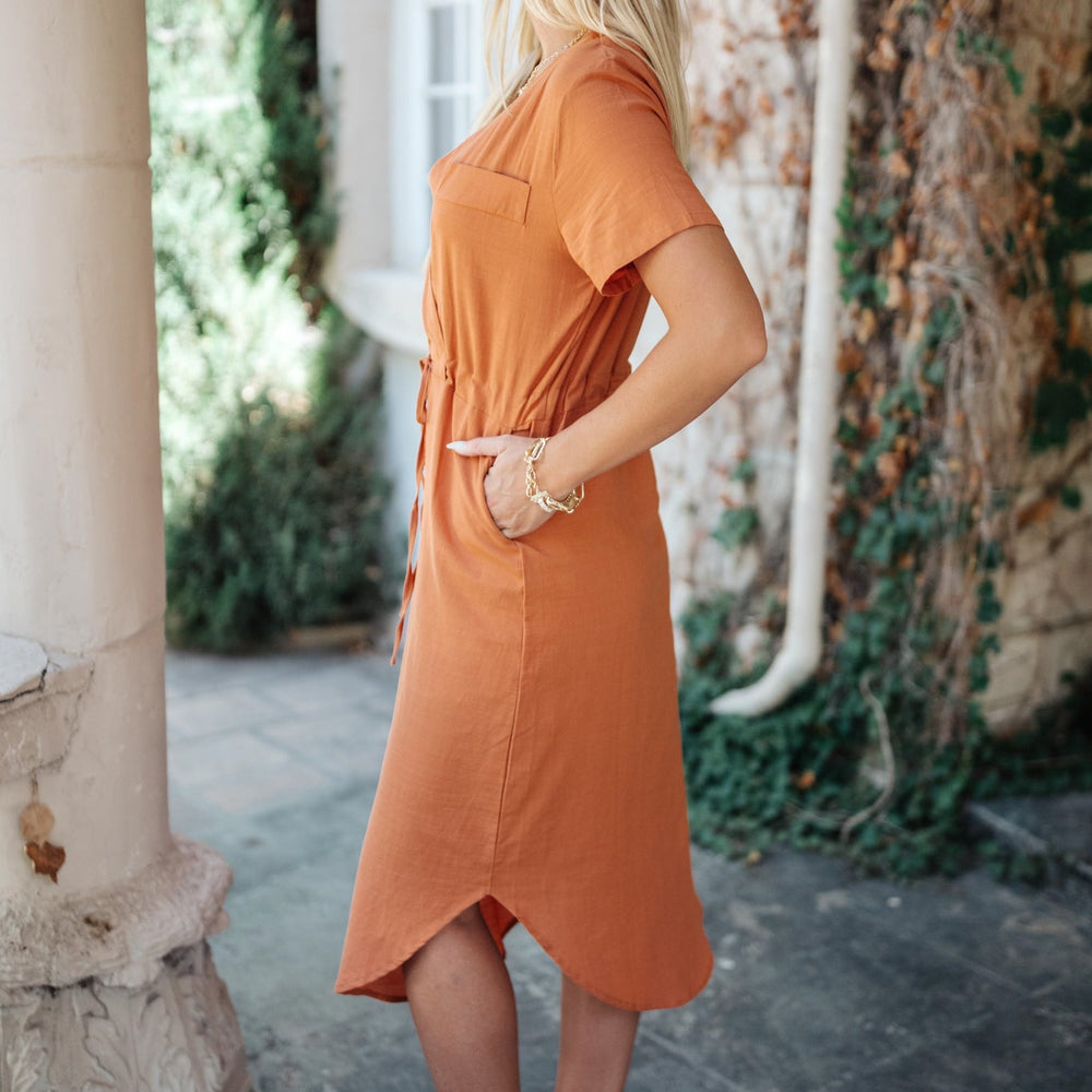 
                      
                        Crossover Midi Dress in Rust
                      
                    