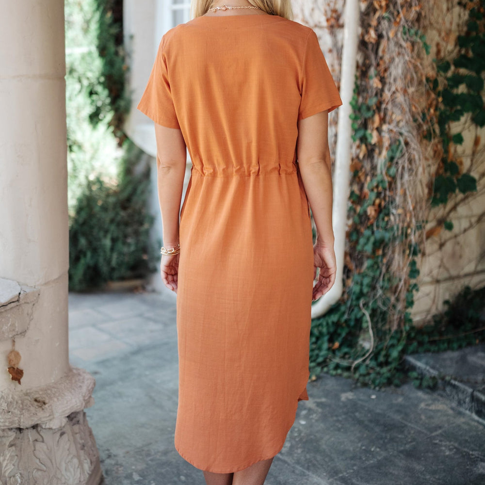 
                      
                        Crossover Midi Dress in Rust
                      
                    