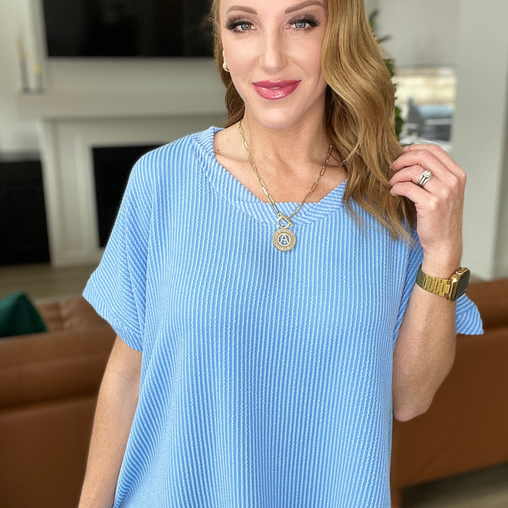 
                      
                        Textured Line Twisted Short Sleeve Top in Sky Blue
                      
                    