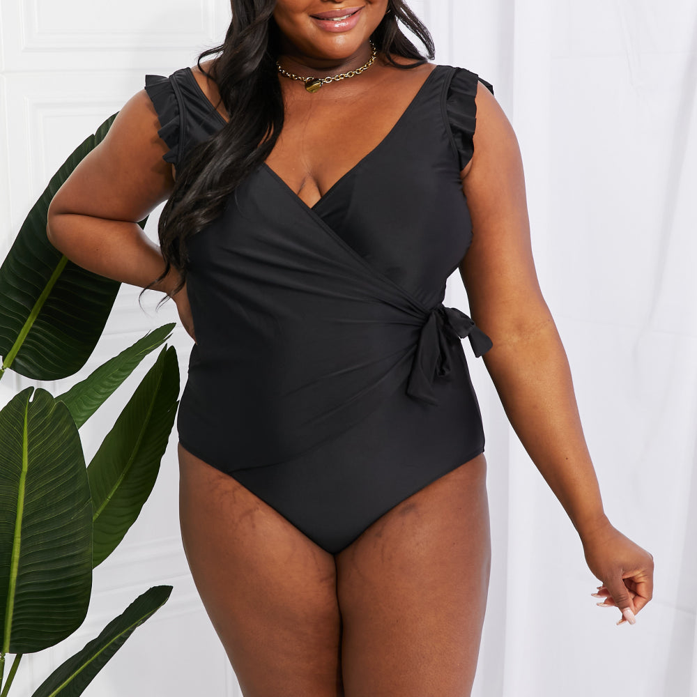 
                      
                        Float On Ruffle Faux Wrap One-Piece in Black
                      
                    