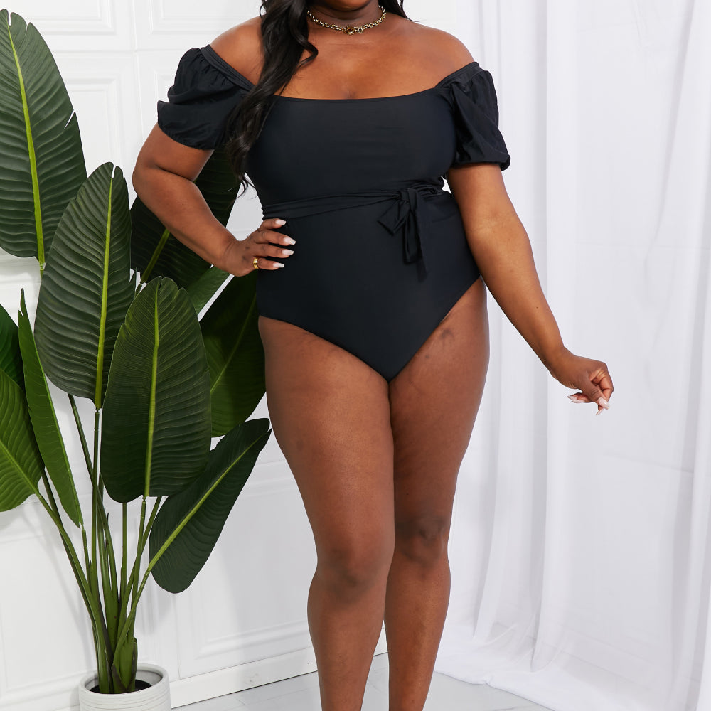 
                      
                        Salty Air Puff Sleeve One-Piece in Black
                      
                    