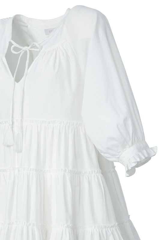 Load image into Gallery viewer, Molli Tiered Tassle Mini Dress
