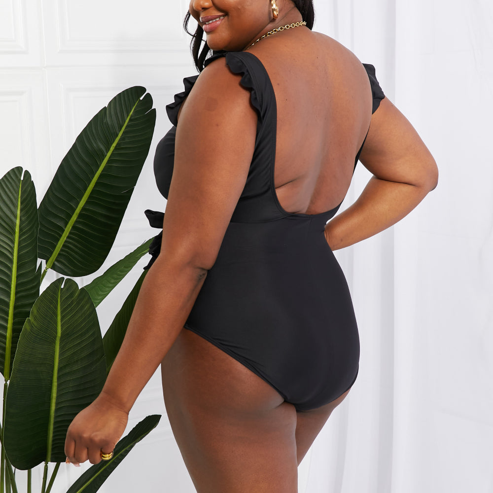 
                      
                        Float On Ruffle Faux Wrap One-Piece in Black
                      
                    